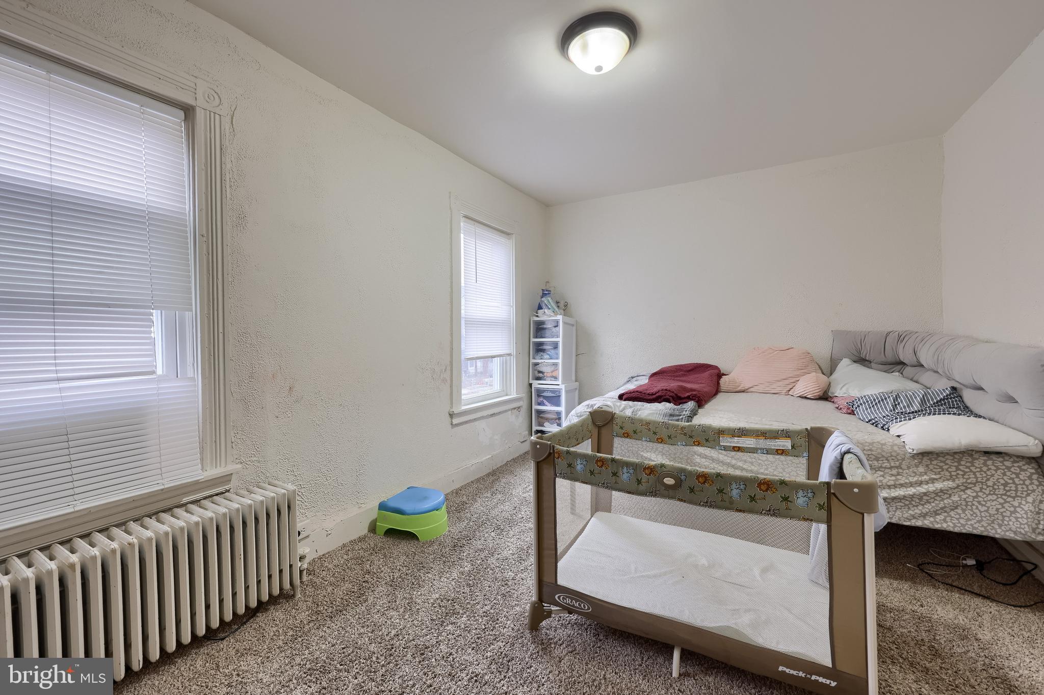 670 Hebrank Street Lancaster, PA 17603 - Photo 12 of 22 a bedroom with a bed and a window