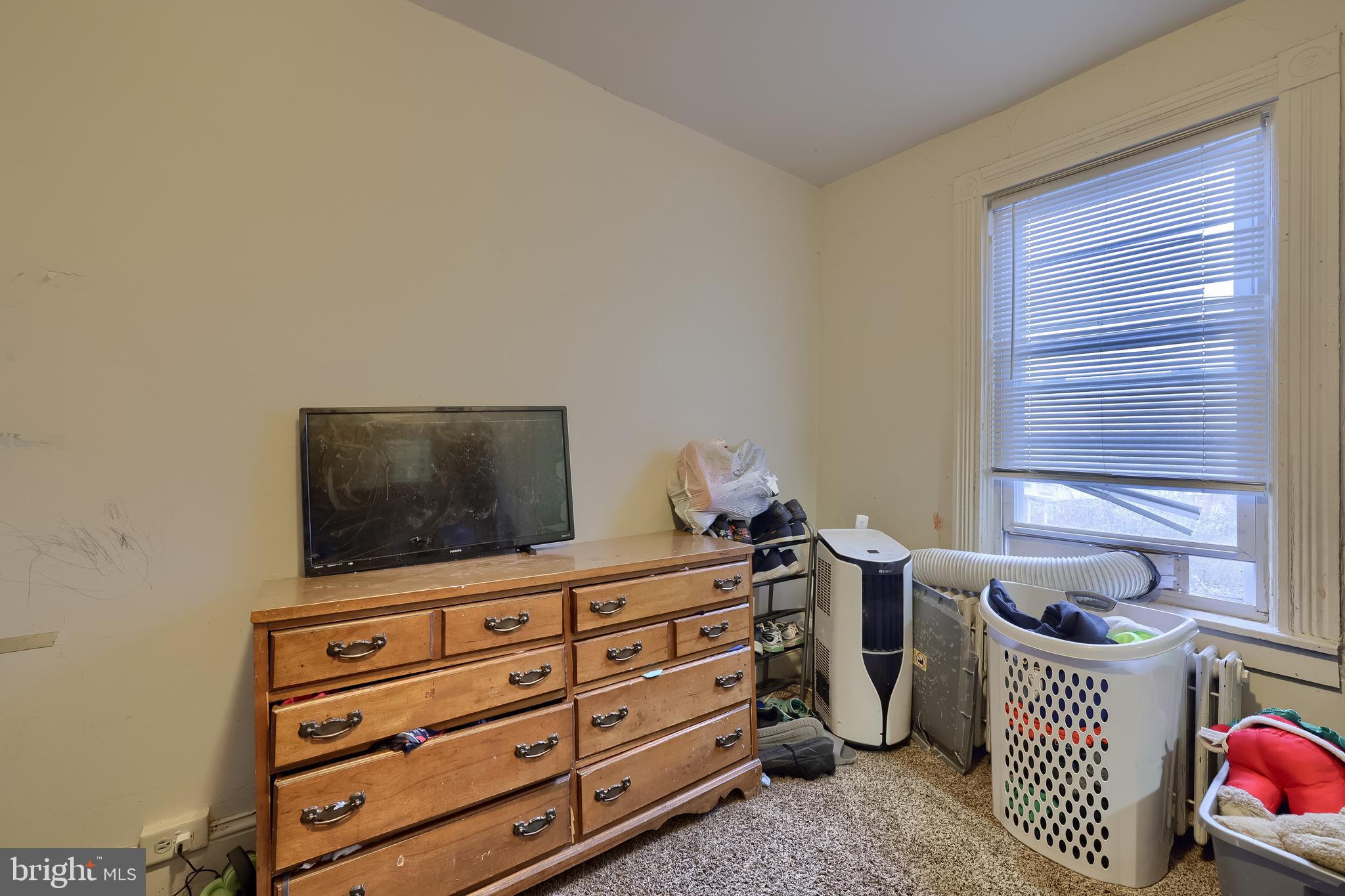 670 Hebrank Street Lancaster, PA 17603 - Photo 16 of 22 a room with furniture and a flat screen tv