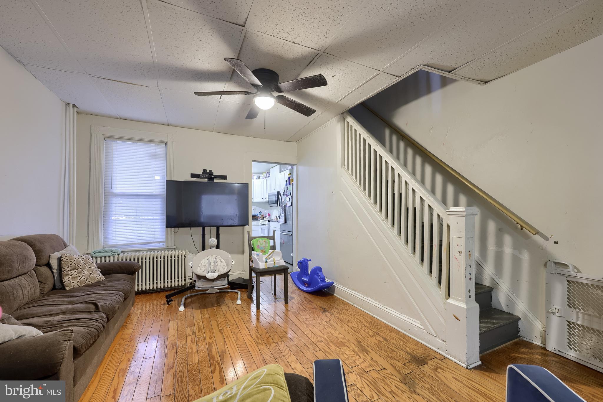 670 Hebrank Street Lancaster, PA 17603 - Photo 3 of 22 a living room with furniture and a wooden floor