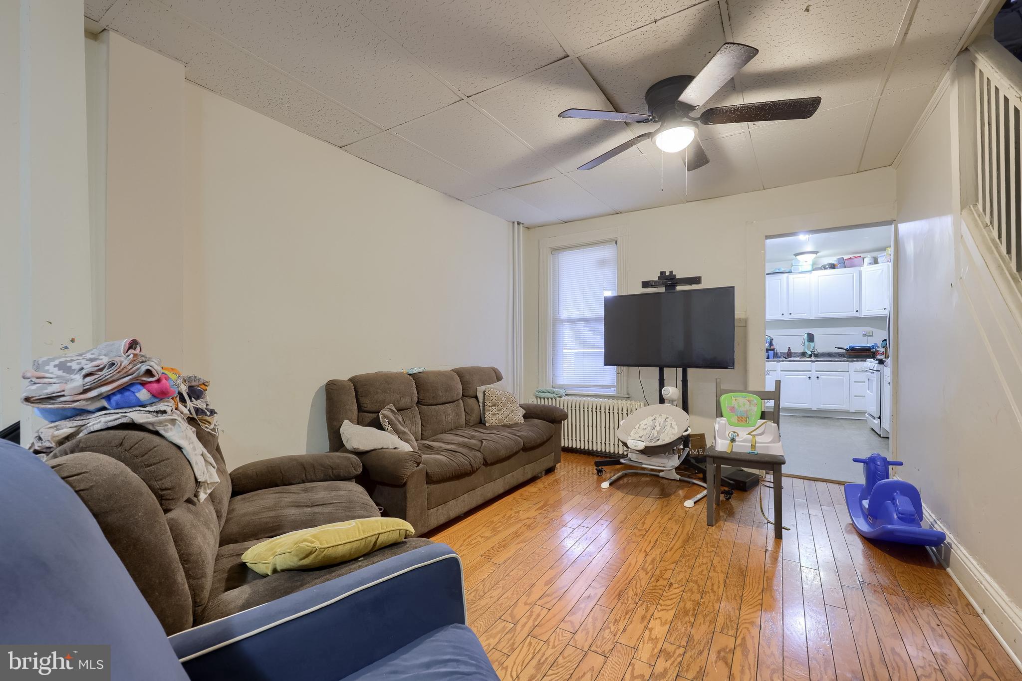 670 Hebrank Street Lancaster, PA 17603 - Photo 5 of 22 a living room with furniture and a wooden floor