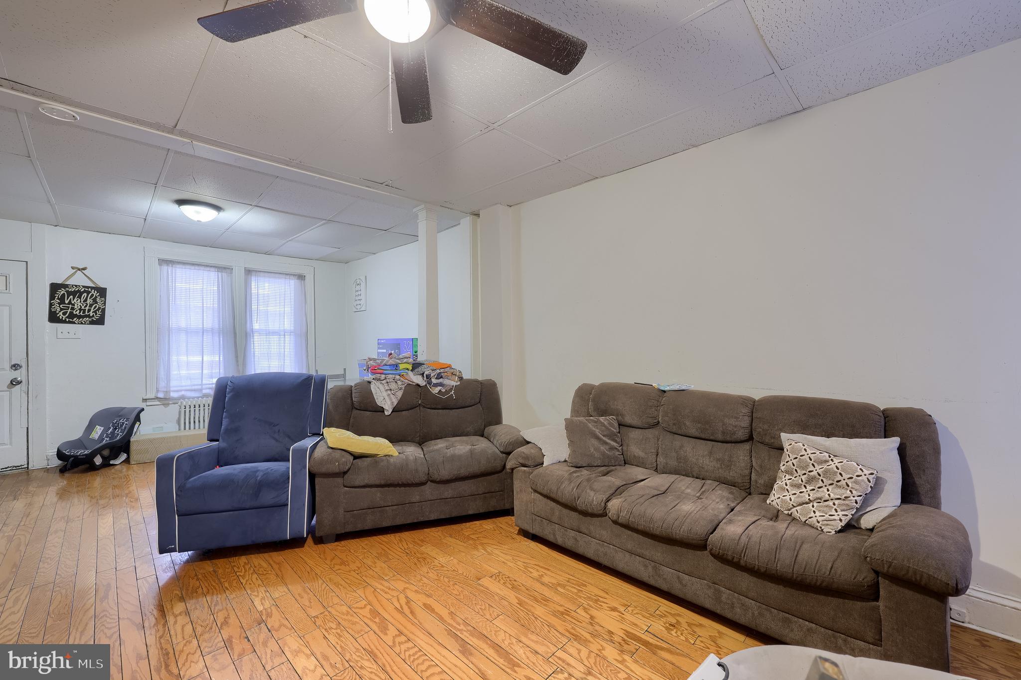 670 Hebrank Street Lancaster, PA 17603 - Photo 6 of 22 a living room with furniture window and a couch