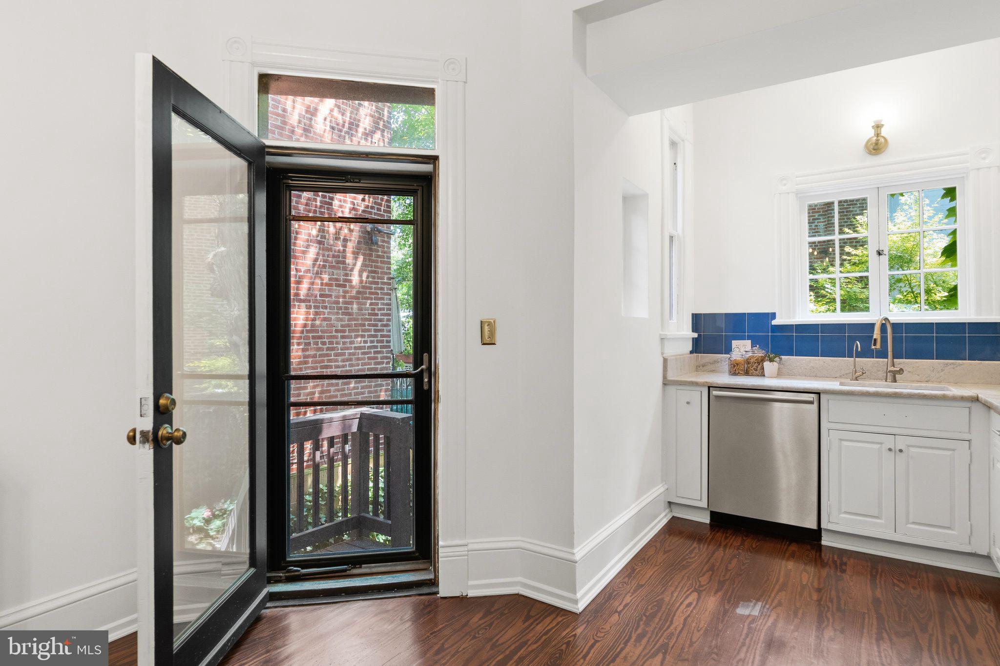 3066 Q Street Northwest Washington, DC 20007 - Photo 19 of 56 Door to Rear Patio Garden Area