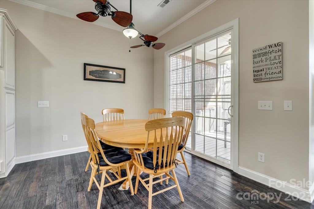 368 Windell Drive Fort Mill, SC 29708 - Photo 12 of 48 a view of a dining room with furniture window and wooden floor