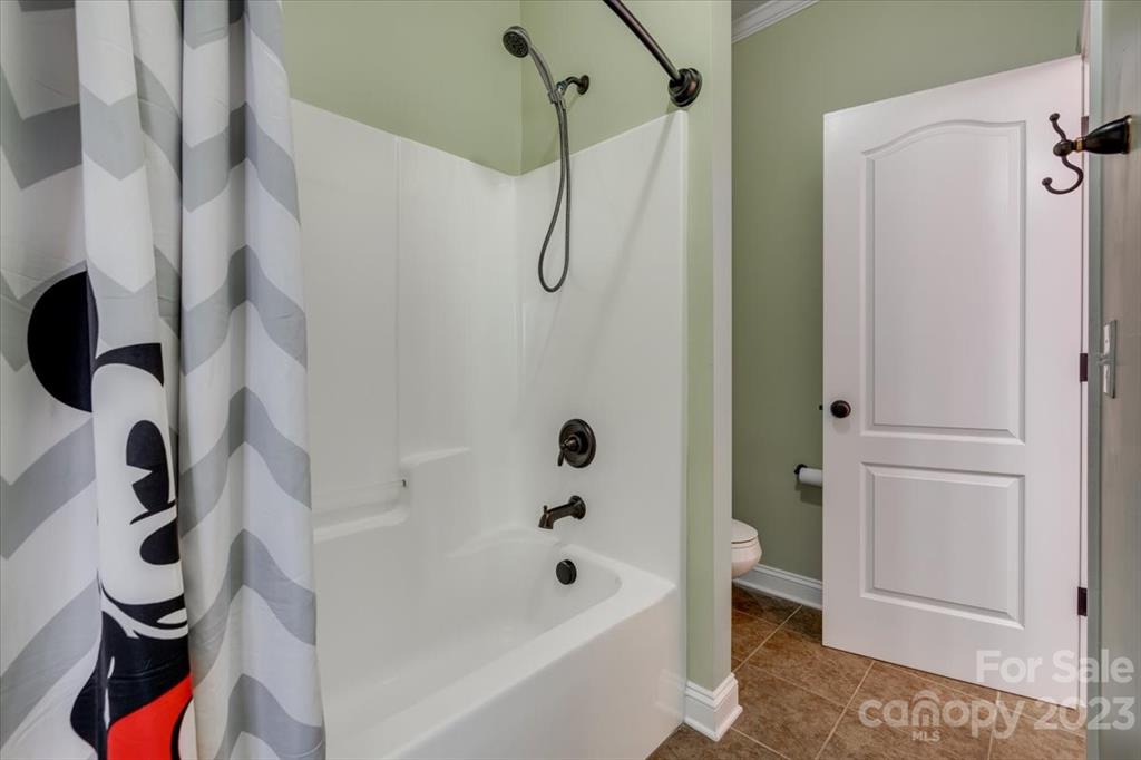 368 Windell Drive Fort Mill, SC 29708 - Photo 27 of 48 a bathroom with a bathtub a window and a shower