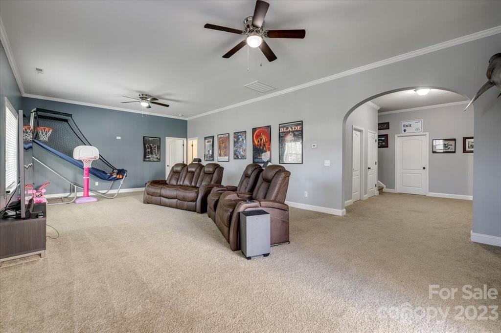 368 Windell Drive Fort Mill, SC 29708 - Photo 38 of 48 a living room with furniture and a gym machine