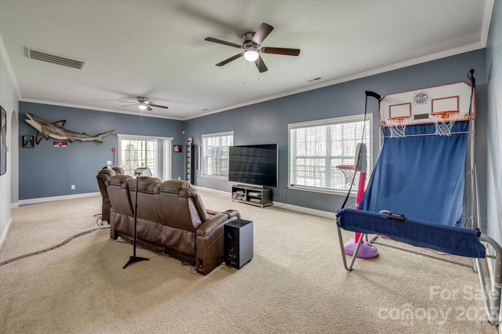 368 Windell Drive Fort Mill, SC 29708 - Photo 39 of 48 a living room with furniture and a flat screen tv