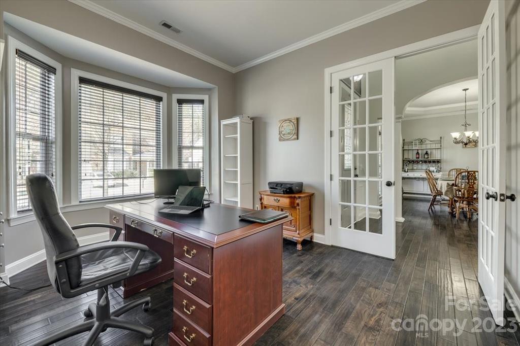 368 Windell Drive Fort Mill, SC 29708 - Photo 5 of 48 a view of a workspace with furniture and a table