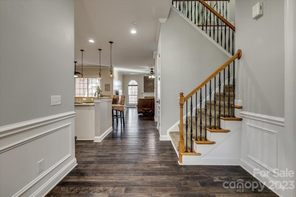 368 Windell Drive Fort Mill, SC 29708 - Photo 6 of 48 a view of entryway and hall with wooden floor