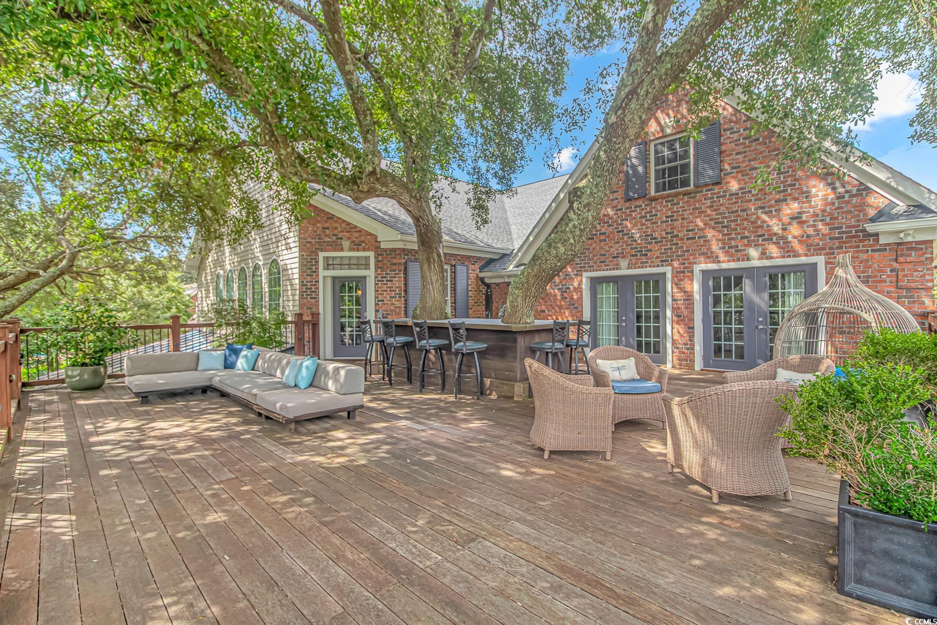 510 Rum Gully Road Murrells Inlet, SC 29576 - Photo 23 of 35 Deck with an outdoor living space and french doors