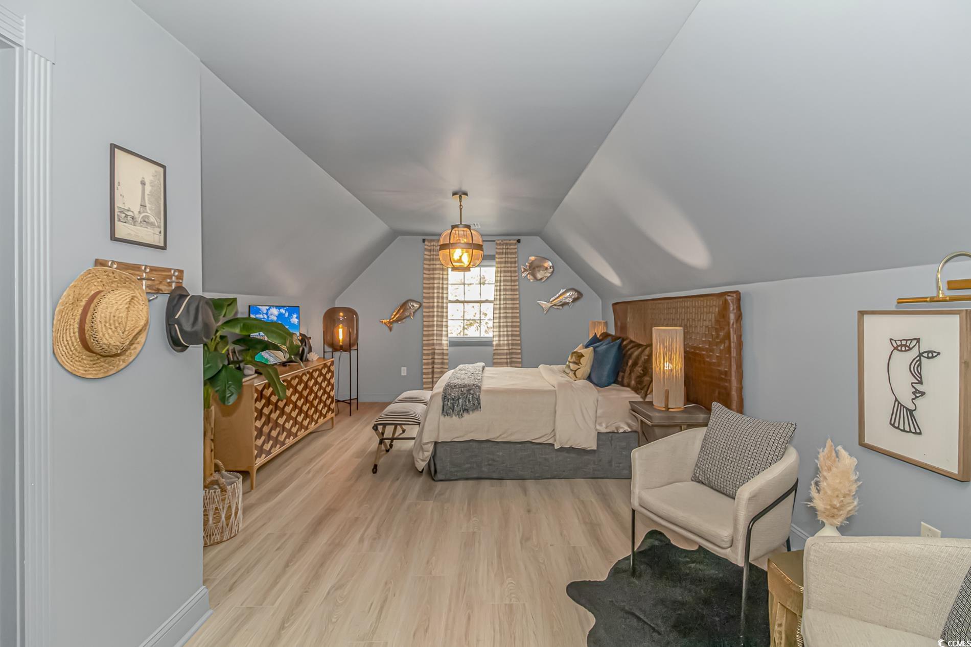 510 Rum Gully Road Murrells Inlet, SC 29576 - Photo 28 of 35 Bedroom with wood finished floors, vaulted ceiling, and baseboards