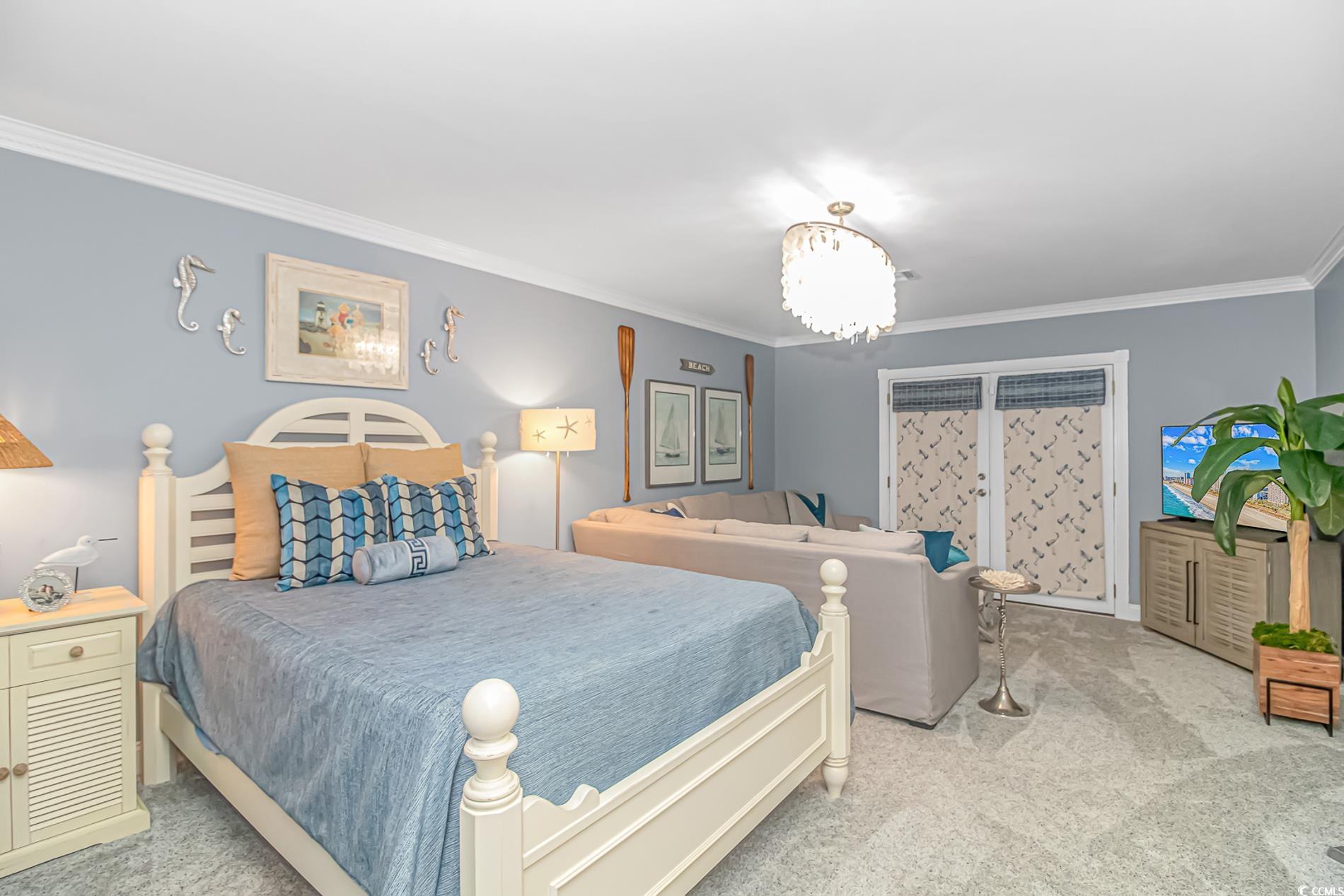 510 Rum Gully Road Murrells Inlet, SC 29576 - Photo 7 of 35 Carpeted bedroom featuring ornamental molding