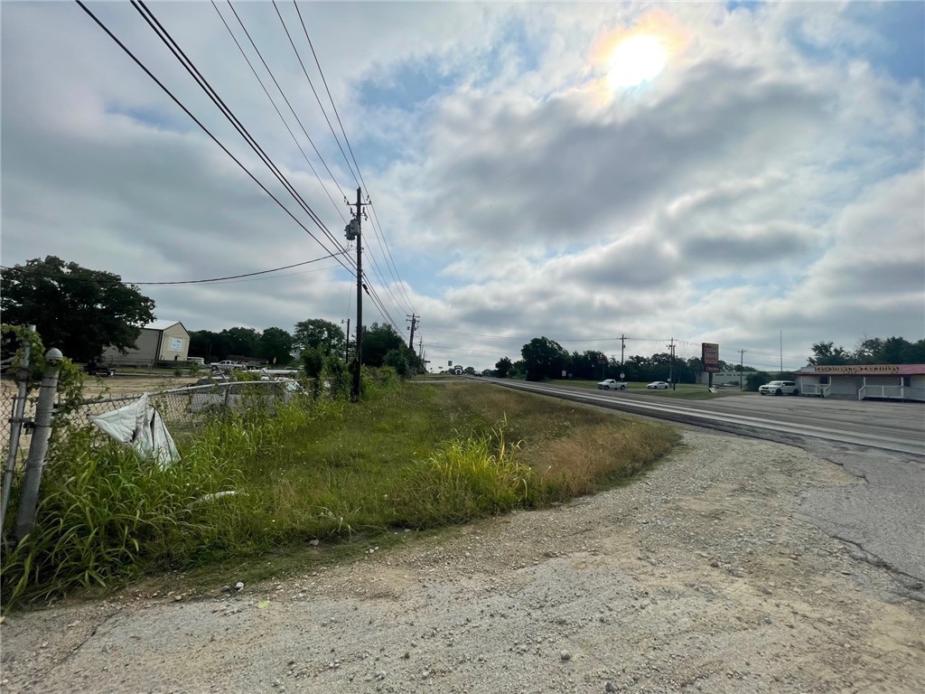 3300 West Sh-21 Bryan, TX 77803 - Photo 5 of 6 a view of a lake with a yard