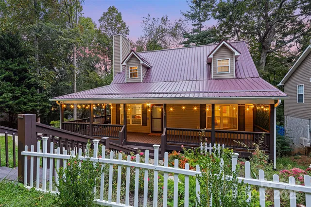a front view of a house with a porch