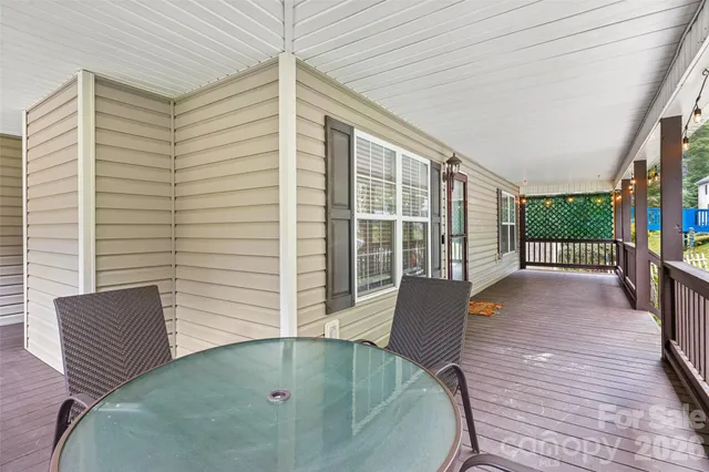 a room with pool table and a table