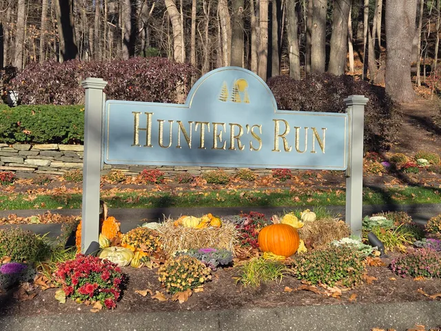 a view of a street with sign board