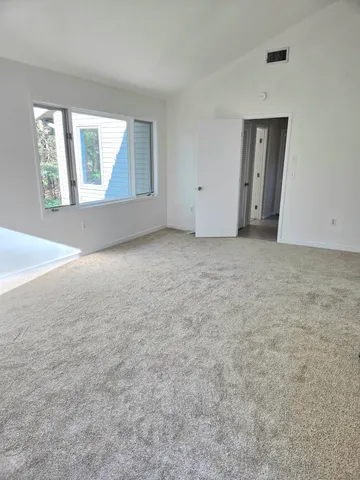 a view of swimming pool with a yard and sitting area