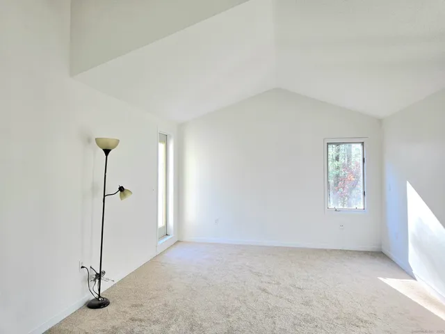 a front view of a house with glass windows