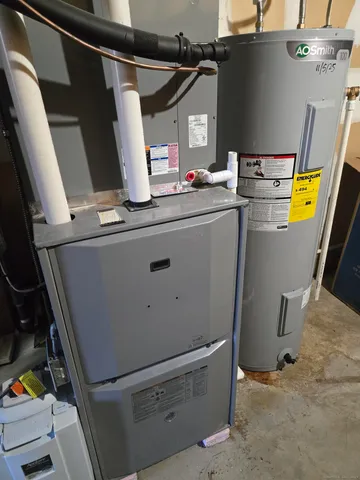 a house that has a tree in front of it