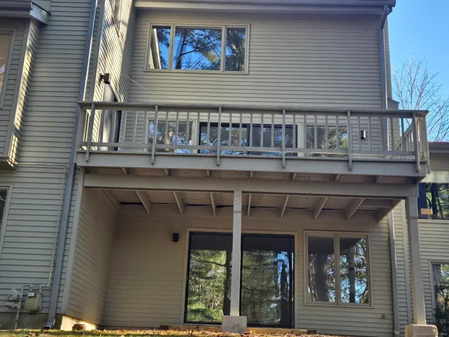 a view of a field with a tree