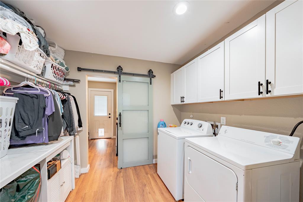 603 Mosley Road Athens, TX 75751 - Photo 10 of 14 a utility room with dryer and washer