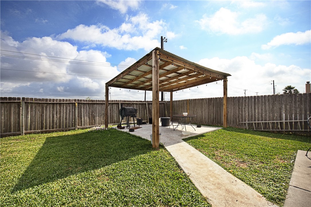 2129 Escondido Street Portland, TX 78374 - Photo 26 of 29 a view of a backyard with sitting area