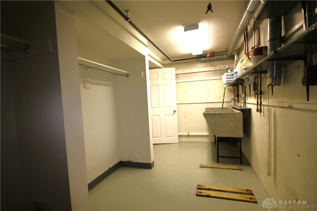 3106 Shroyer Road Dayton, OH 45429 - Photo 35 of 44 Laundry Room with Hanging Racks