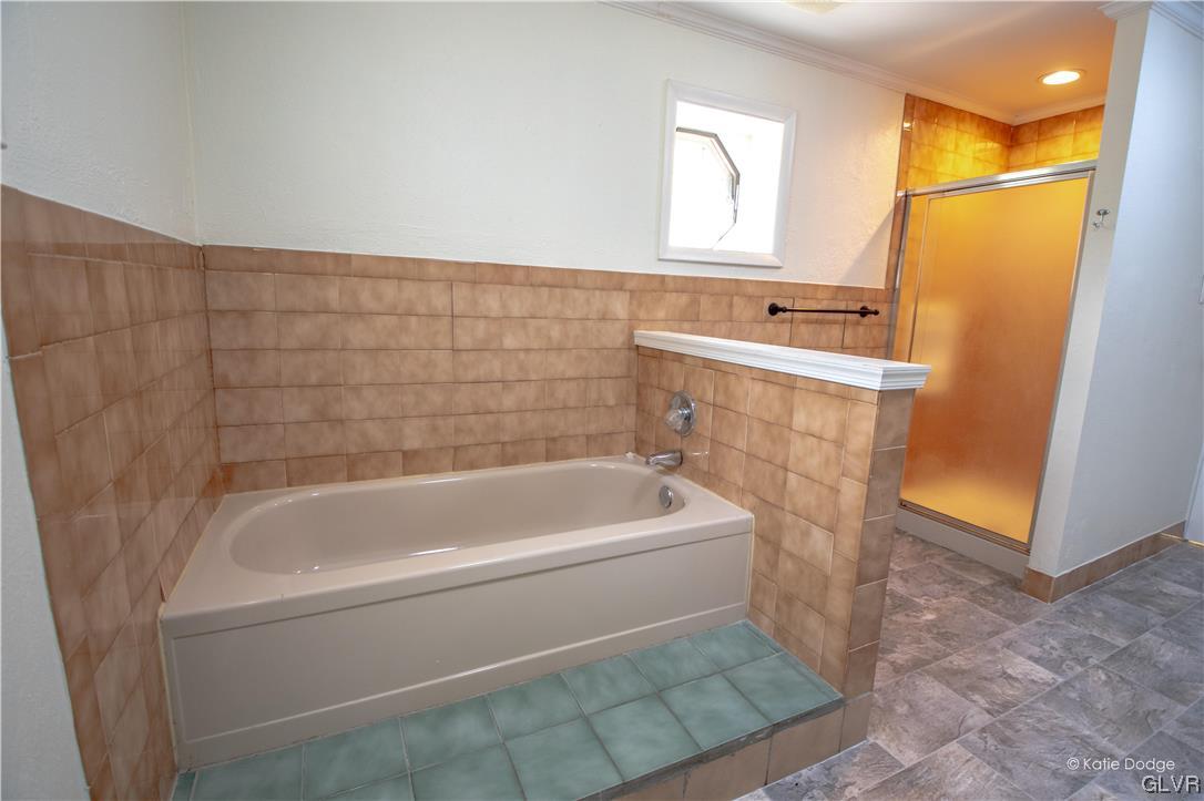 395 Buttermilk Road Easton, PA 18042 - Photo 13 of 41 a white bath tub sitting next to a white sink