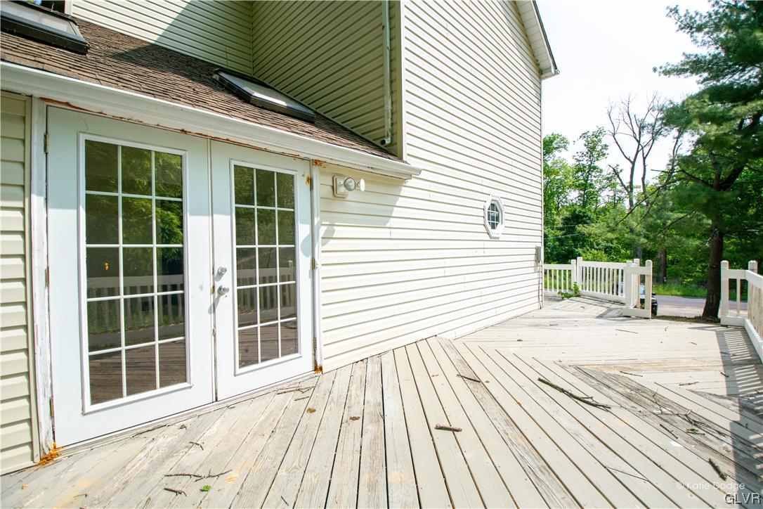 395 Buttermilk Road Easton, PA 18042 - Photo 28 of 41 a view of a backyard with a balcony