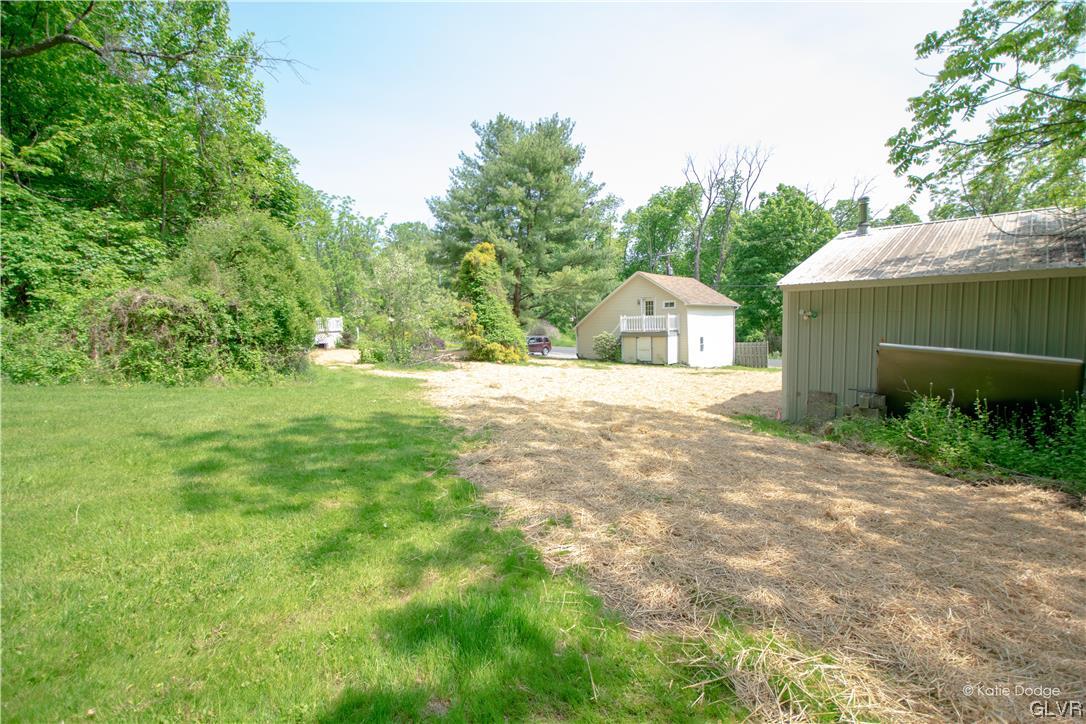 395 Buttermilk Road Easton, PA 18042 - Photo 39 of 41 a view of a house with a yard and garage