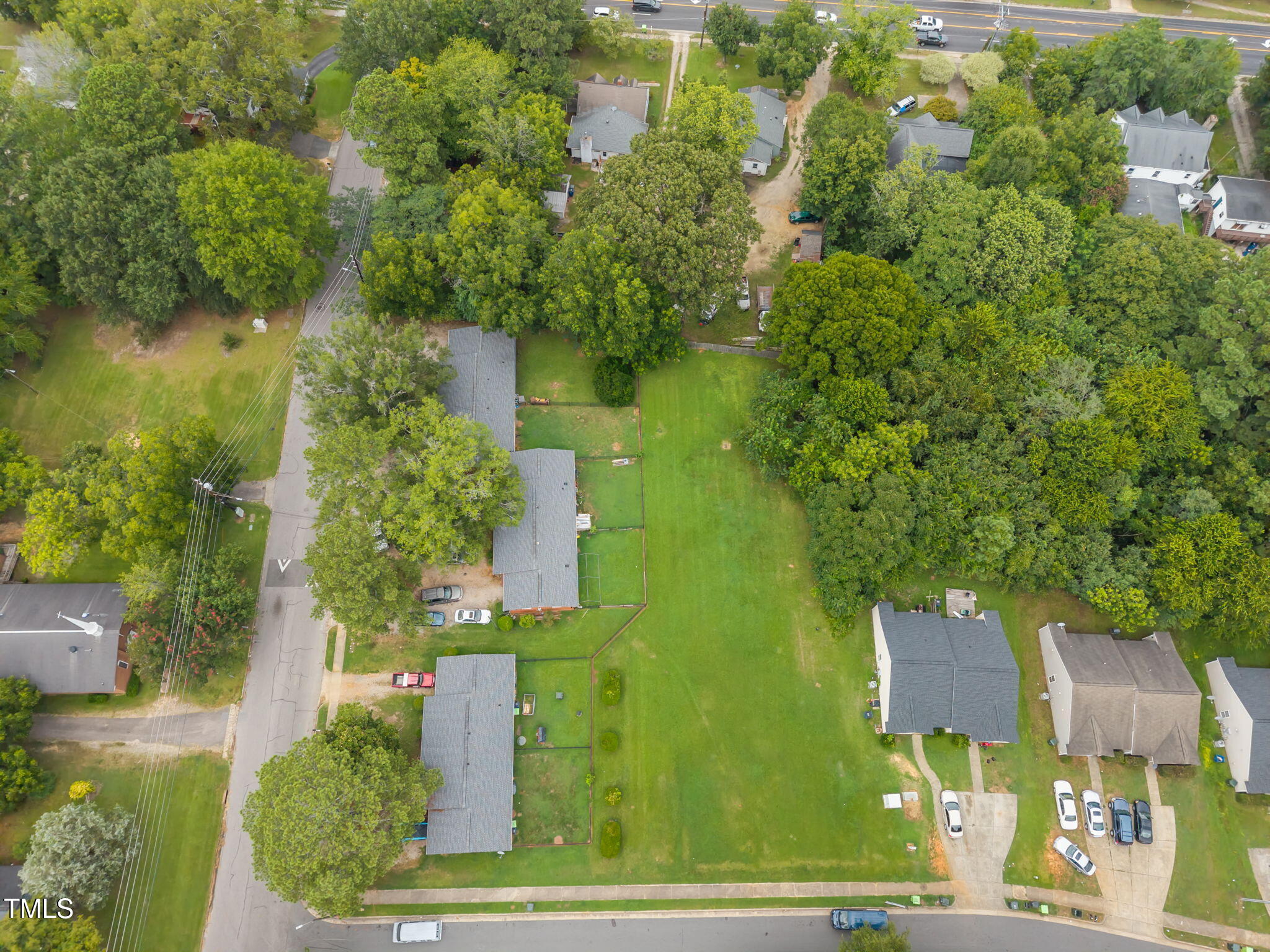 419 Rose Lane Raleigh, NC 27610 - Photo 3 of 22 1-web-or-mls-DJI_20250801164120_0419_D
