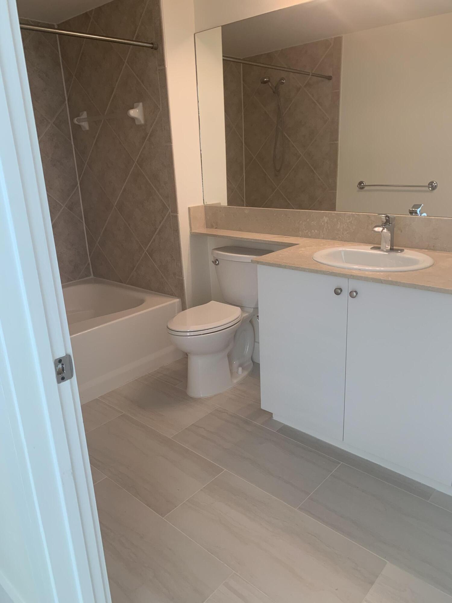 100 Northeast 6th Street, Unit 204 Boynton Beach, FL 33435 - Photo 12 of 16 IMG_2930