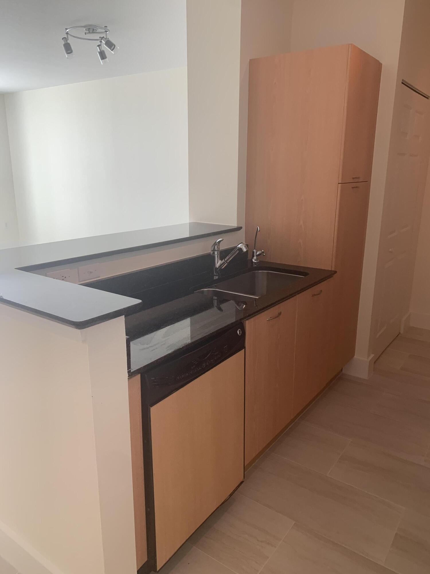 100 Northeast 6th Street, Unit 204 Boynton Beach, FL 33435 - Photo 3 of 16 IMG_2925