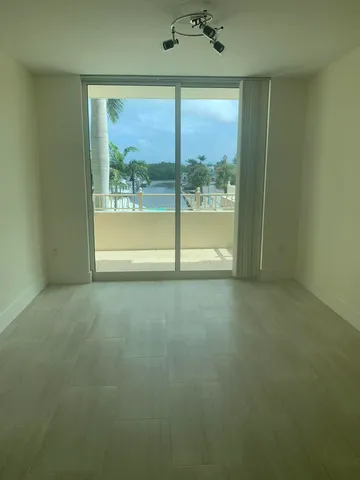 a view of a room with a large window