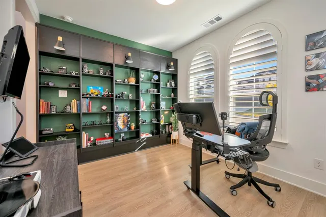 a workspace with furniture and a window