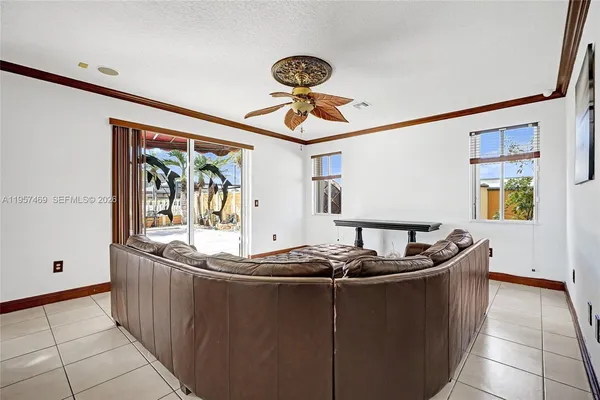 a kitchen with stainless steel appliances granite countertop a sink and a stove