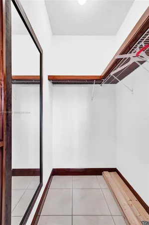 a view of a room with rack on the wall