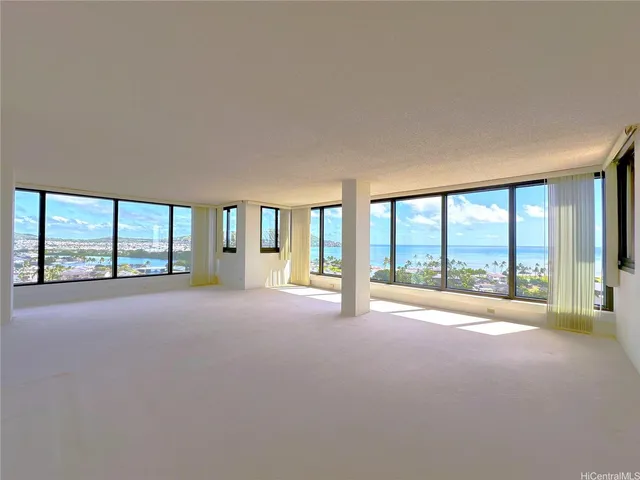 an empty room with windows