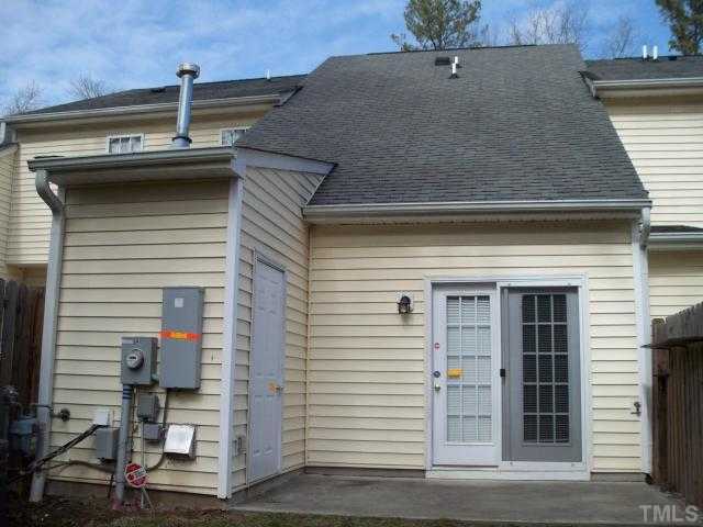 844 Horton Road, Unit 24 Durham, NC 27704 - Photo 2 of 3 a side view of a house with garage