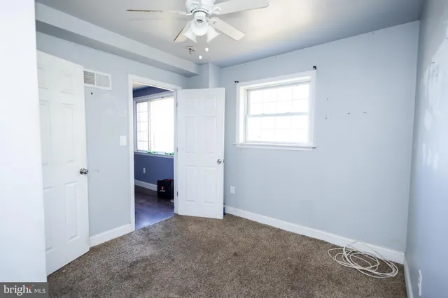 a view of entryway with stairs and wooden floor