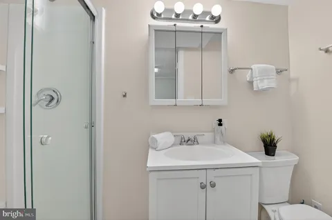 a bathroom with a sink and mirror