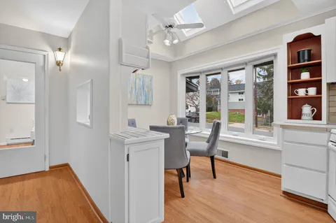 a view of a livingroom with furniture and window