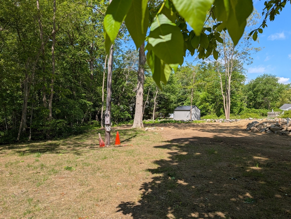 105 Forest Road Salisbury, MA 01952 - Photo 3 of 4 a view of road with large trees
