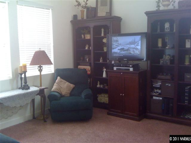 2000 Echo Valley Parkway Reno, NV 89521 - Photo 3 of 8 a living room with furniture and a lamp