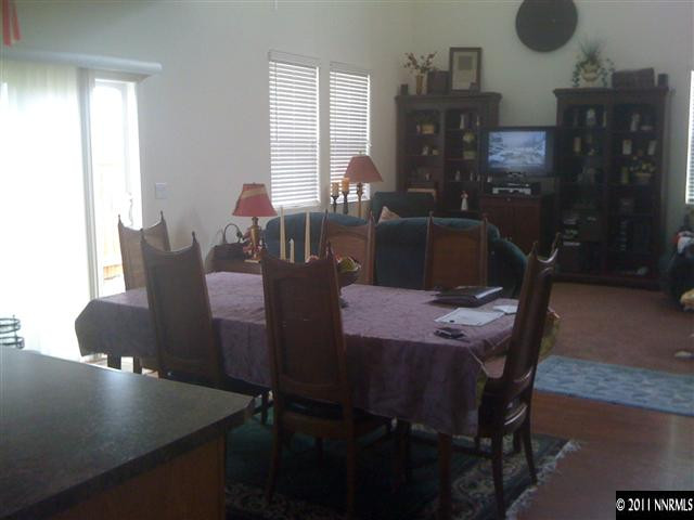 2000 Echo Valley Parkway Reno, NV 89521 - Photo 5 of 8 a view of a dining room with furniture and wooden floor