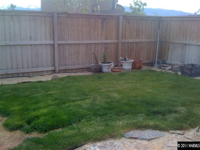 2000 Echo Valley Parkway Reno, NV 89521 - Photo 6 of 8 a view of a backyard with tub and entertaining space