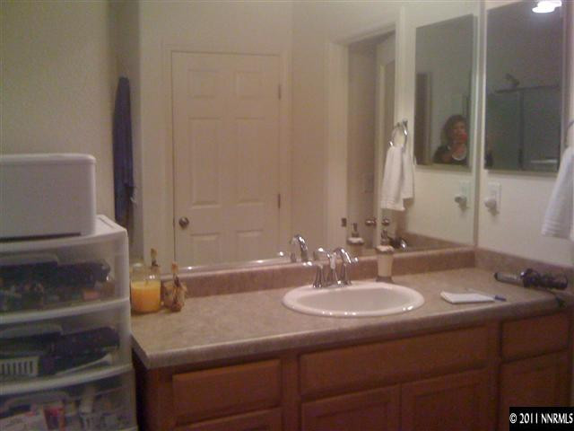2000 Echo Valley Parkway Reno, NV 89521 - Photo 8 of 8 a bathroom with a sink and a mirror