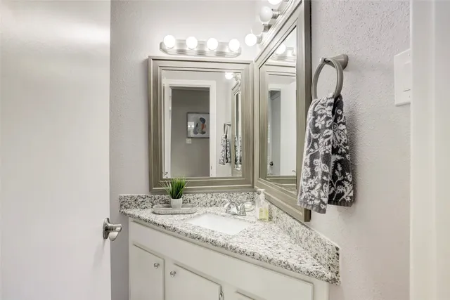 a view of a hallway view with staircase