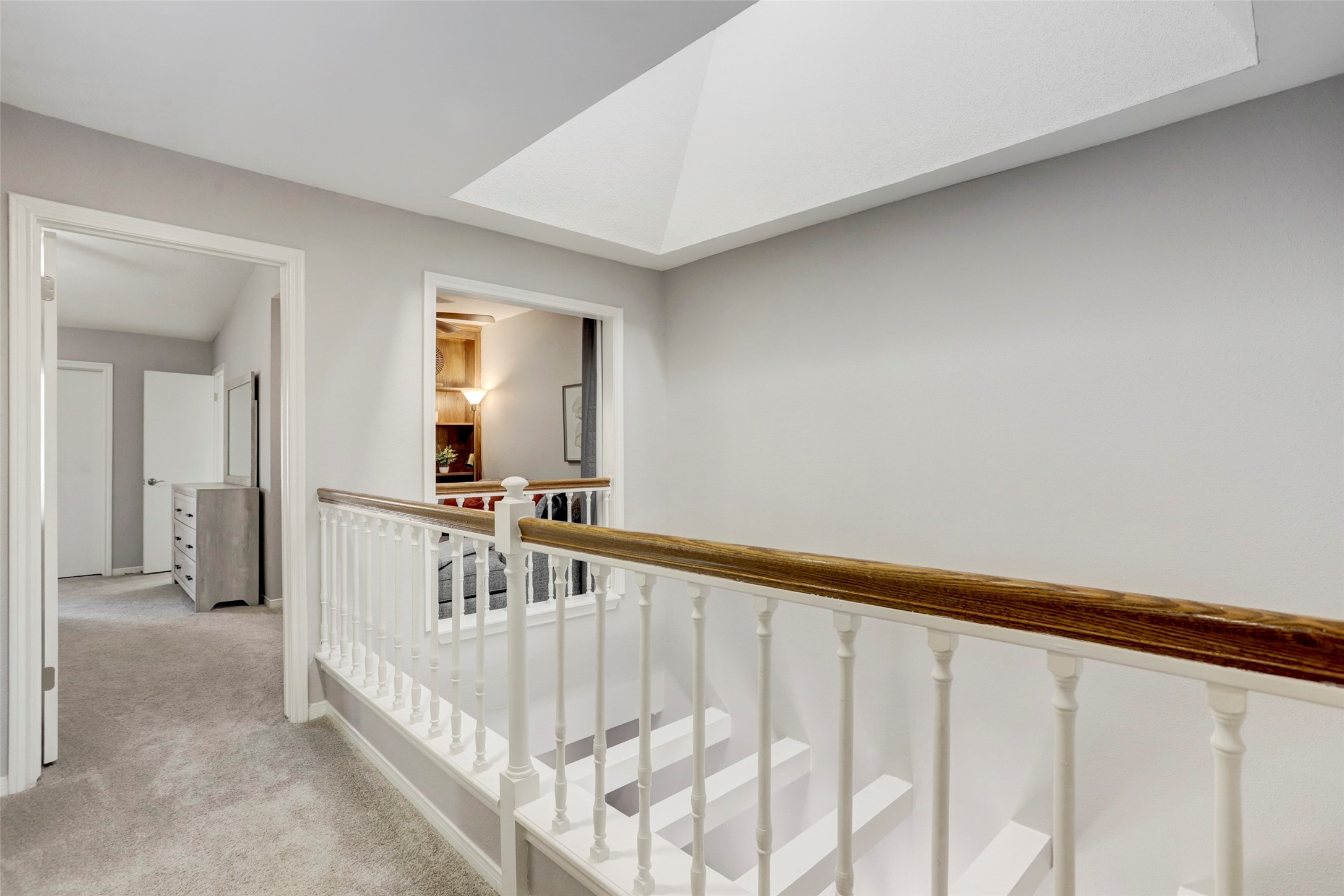 1911 Bering Drive, Unit 34 Houston, TX 77057 - Photo 19 of 26 a view of a hallway view with staircase