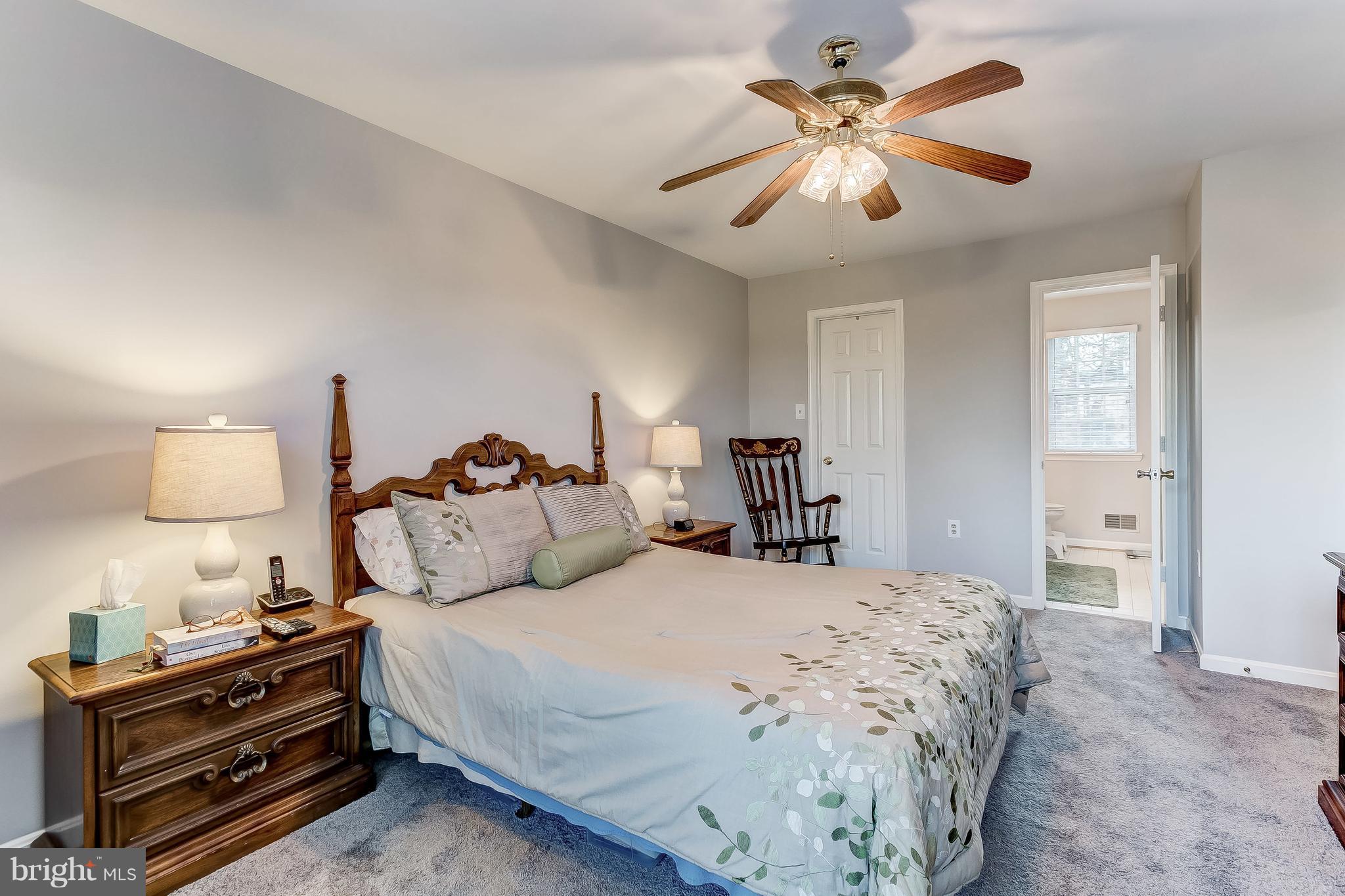4313 Mispillion Road Baltimore, MD 21236 - Photo 19 of 38 a bedroom with bed and a chandelier