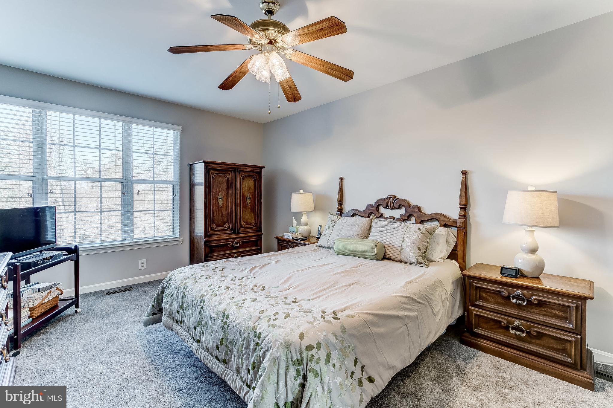 4313 Mispillion Road Baltimore, MD 21236 - Photo 21 of 38 a bedroom with a bed and wooden floor